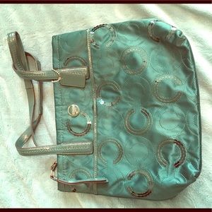 Unique teal colored Coach